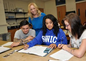 Southwestern Illinois College A group of students completing a math assignment