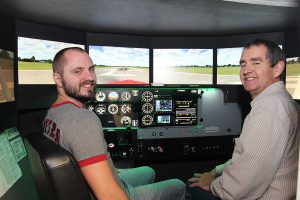 Southwestern Illinois College Student and instructor in simulator