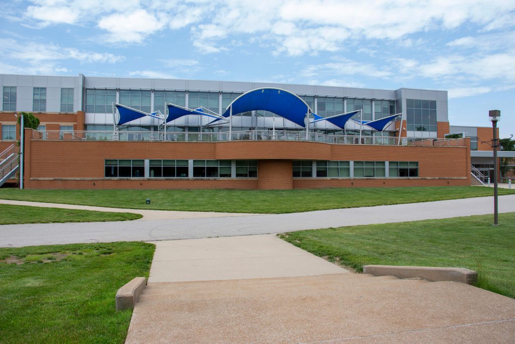 Photo of the Liberal Arts building's covered patio from a distance.