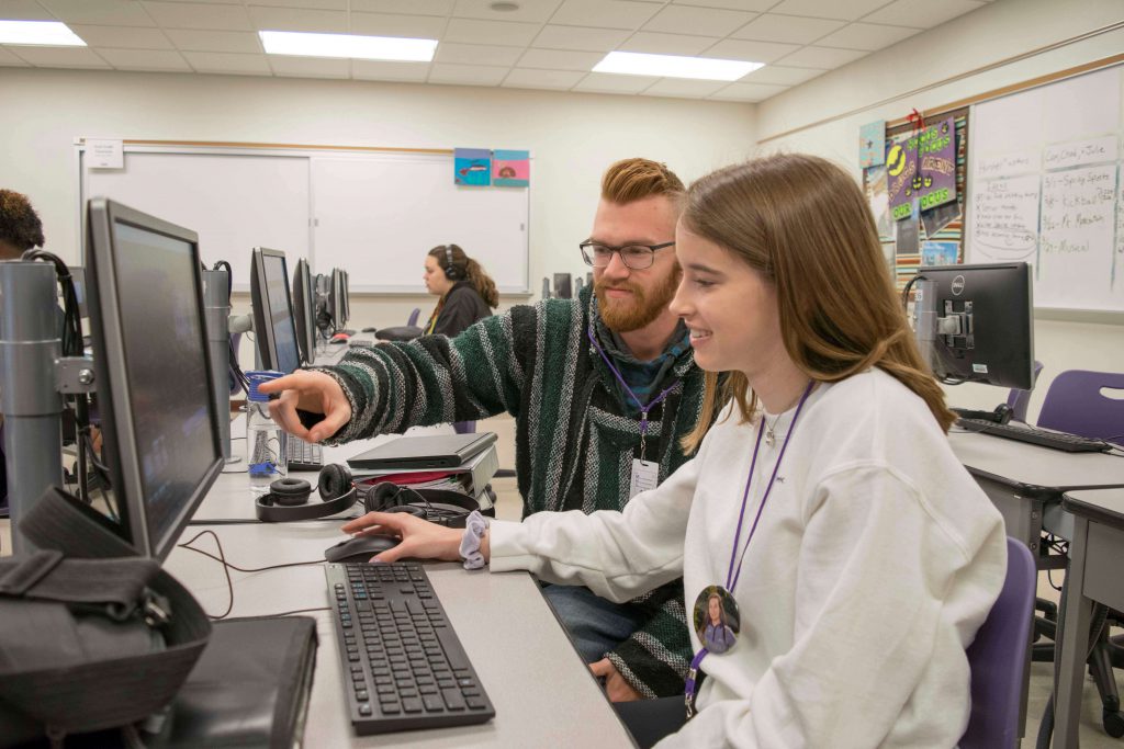 high school students learn about video editing