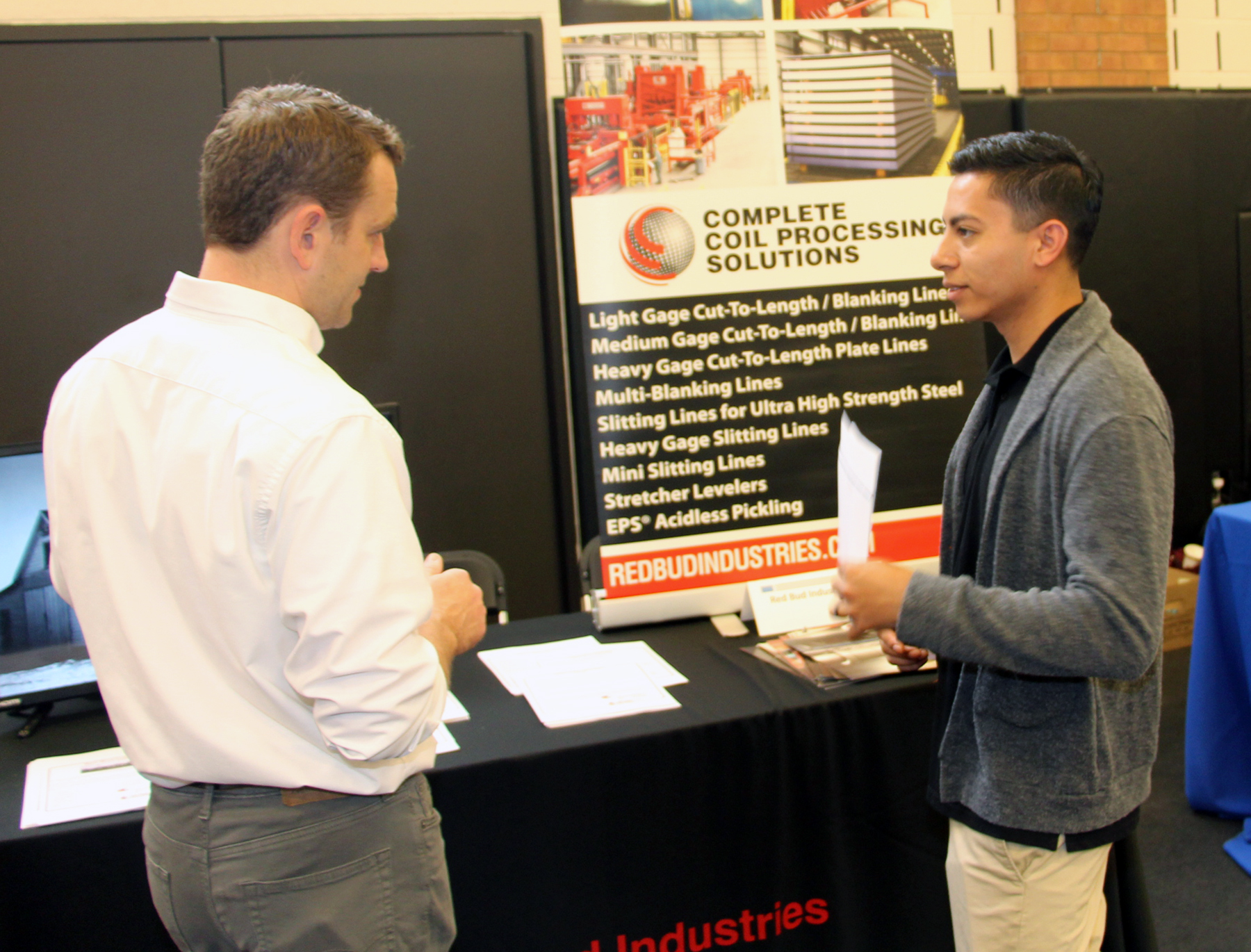 Red bud industries employer talks to a SWIC student at the spring 2019 job fair