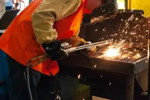 Student welding in welding class.