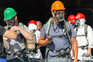 Fire Science Hazardous Materials training two men geared up