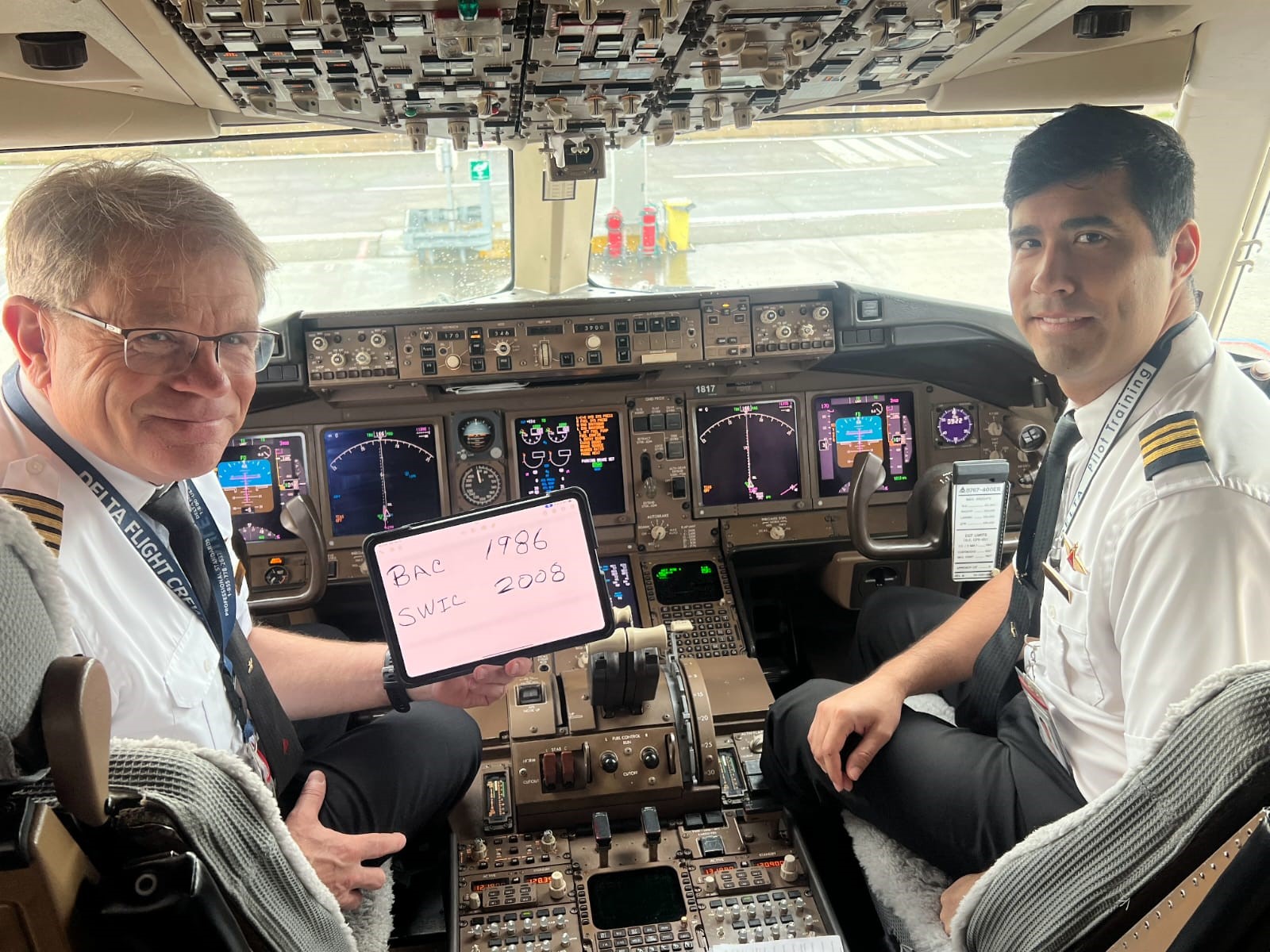 Featured in the photo are two past SWIC students pictured who both fly for Delta, Captain Dale Helfrich (left) of Mascoutah, IL, and First Officer Paul Anguita (right) of Millstadt, IL,, were in for a nice surprise when they made each other's acquaintance. Having arrived a bit early to their aircraft cockpit, they were exchanging greetings before getting settled in and going through all their pre-flight checklists prior to passenger boarding for their assigned flight from New York to Milan, Italy. It wasn't long before they discovered that they were both alumni of the same flight school, SWIC's Aviation Pilot Training program. You never know where you might run into a fellow SWIC student or graduate!