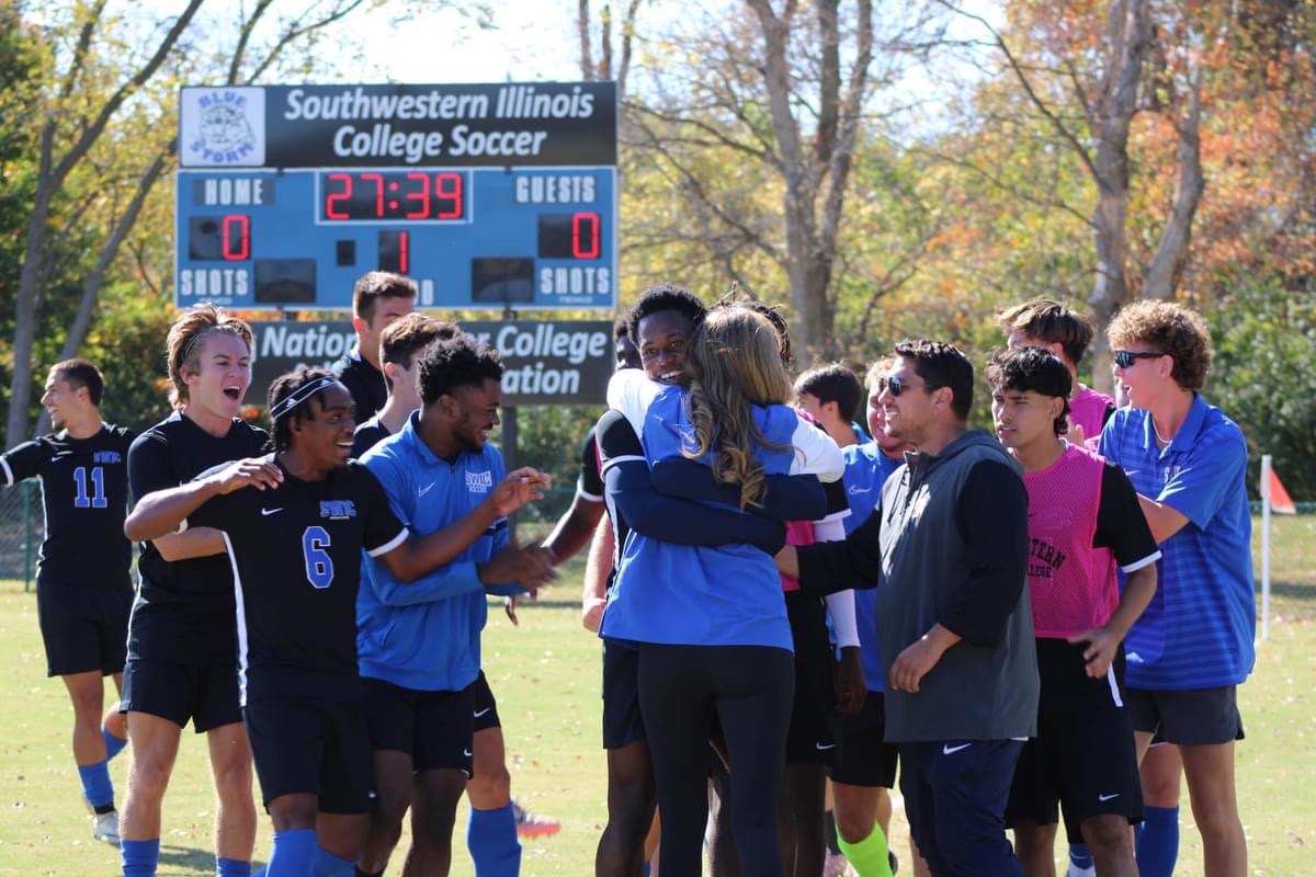 Men's soccer players and Coach